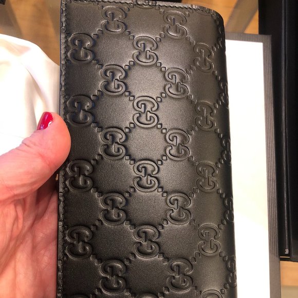 Gucci Monogram Embossed Wallet in Black for Men